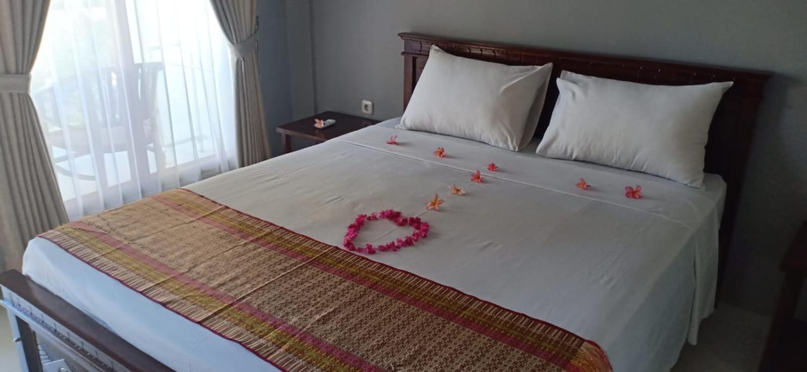 Rasti 2 Homestay Kuta  Pokoj fotografie